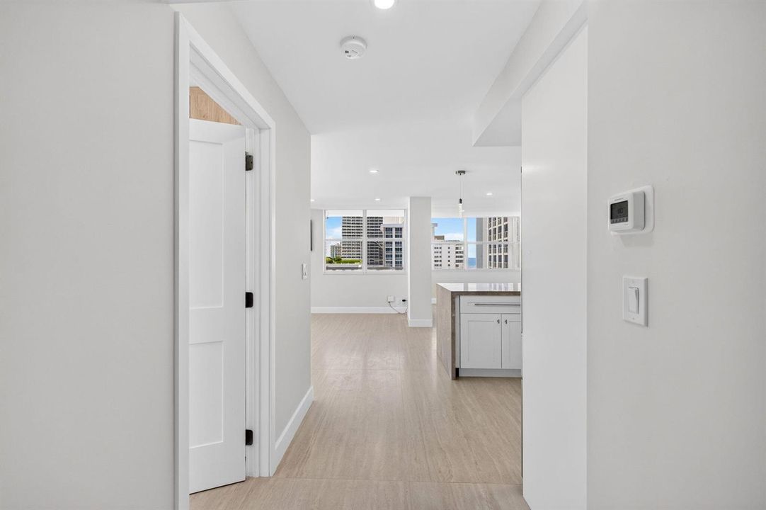 Entrance with guest bedroom on left