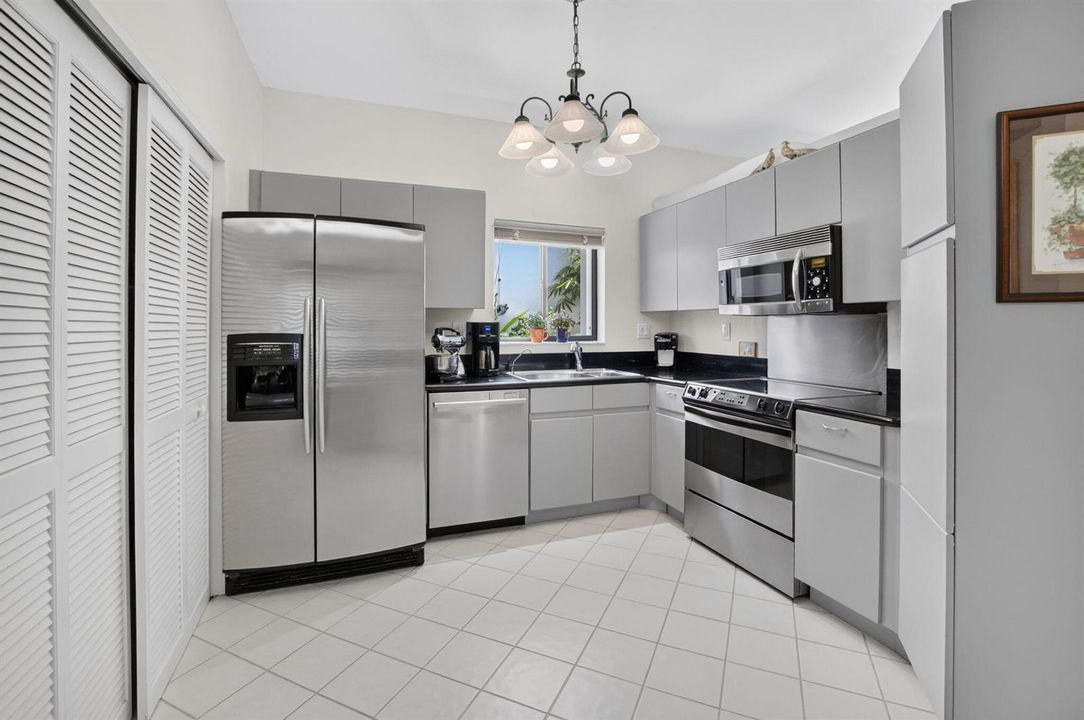 UPDATED KITCHEN WITH CORIAN COUNTERTOPS
