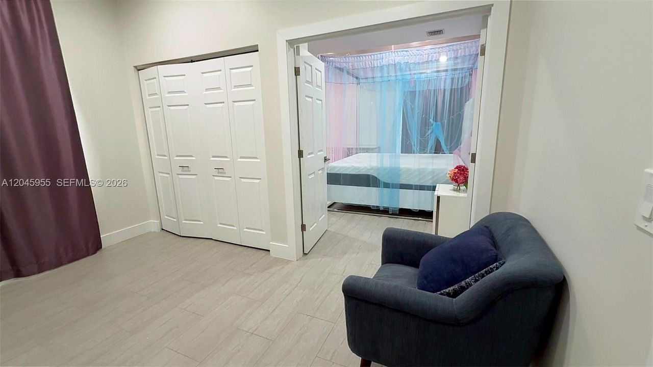 With Murphy bed above garage