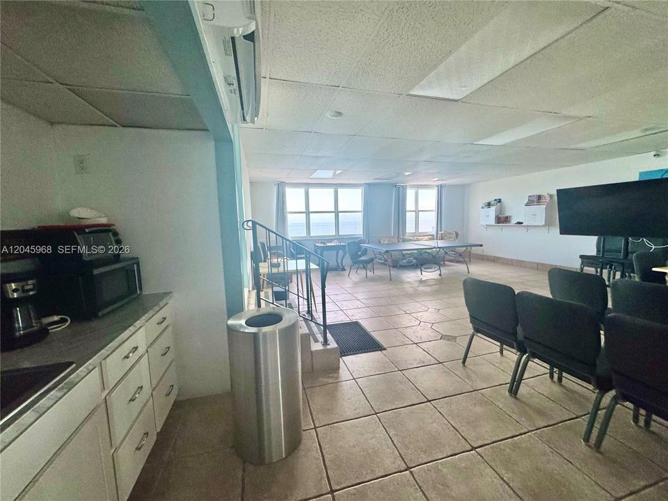 COMMUNITY ROOM, PING PONG, KITCHEN