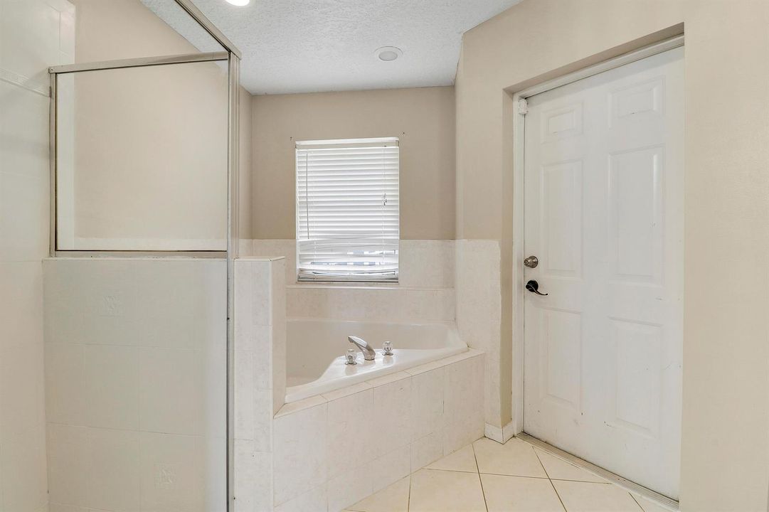 Primary Bathroom w/Access to Patio
