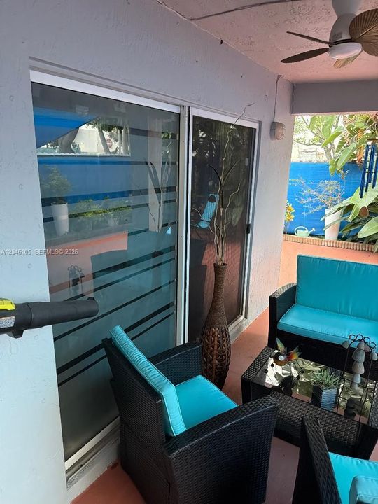 MASTER BEDROOM SLIDING GLASS DOORS TO PATIO