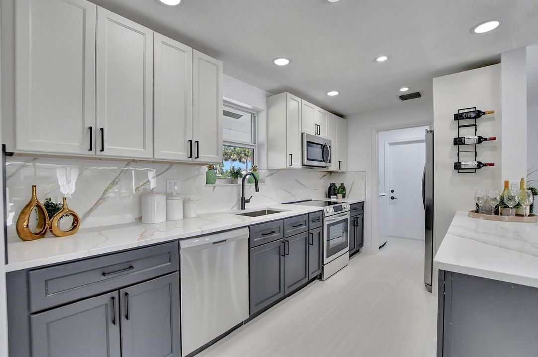 Gourmet Kitchen leads to Utility Room