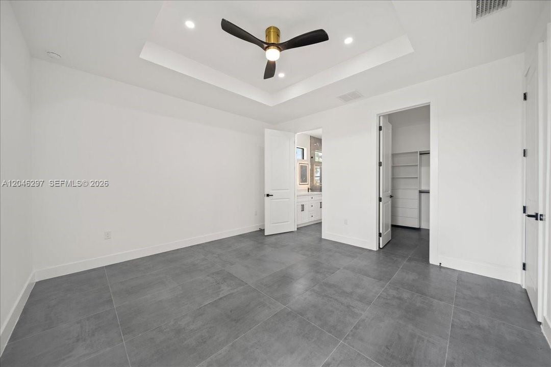 Spacious primary suite designed with comfort and sophistication in mind