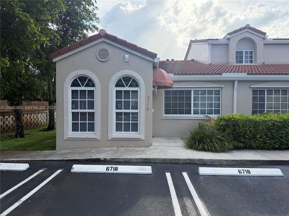 With 2 assigned spaces additional guest spaces on the side and front of unit