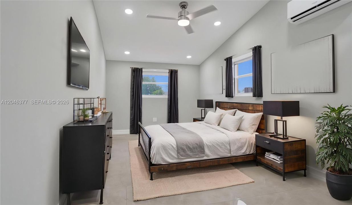Large 4th Bedroom with vaulted ceilings just completed and virtually staged