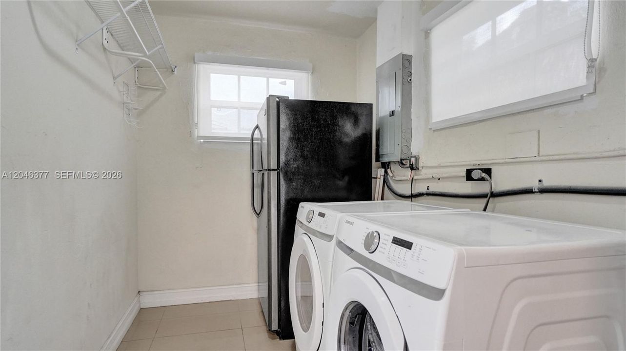 Deep laundry room with Extra Fridge