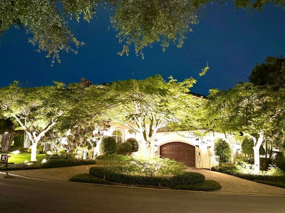 House front lit up at night