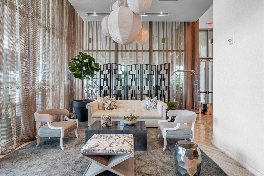 Designer resident lounge with curated seating at Biscayne Beach