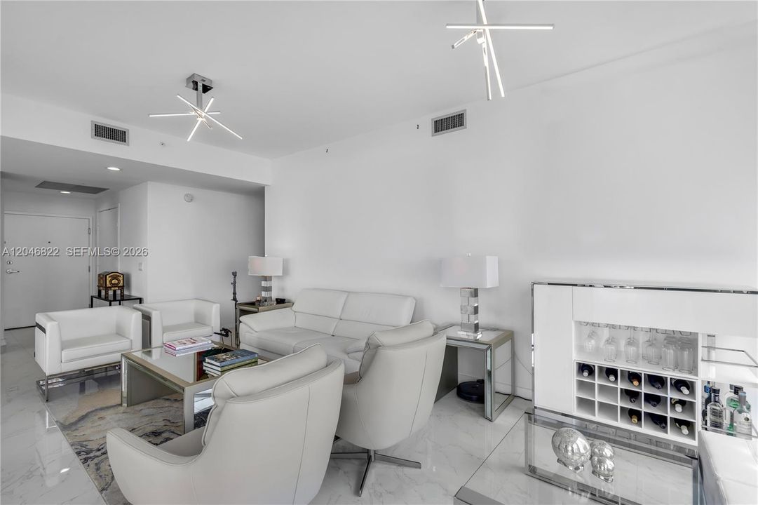 Second living area with abundant light and skyline outlook