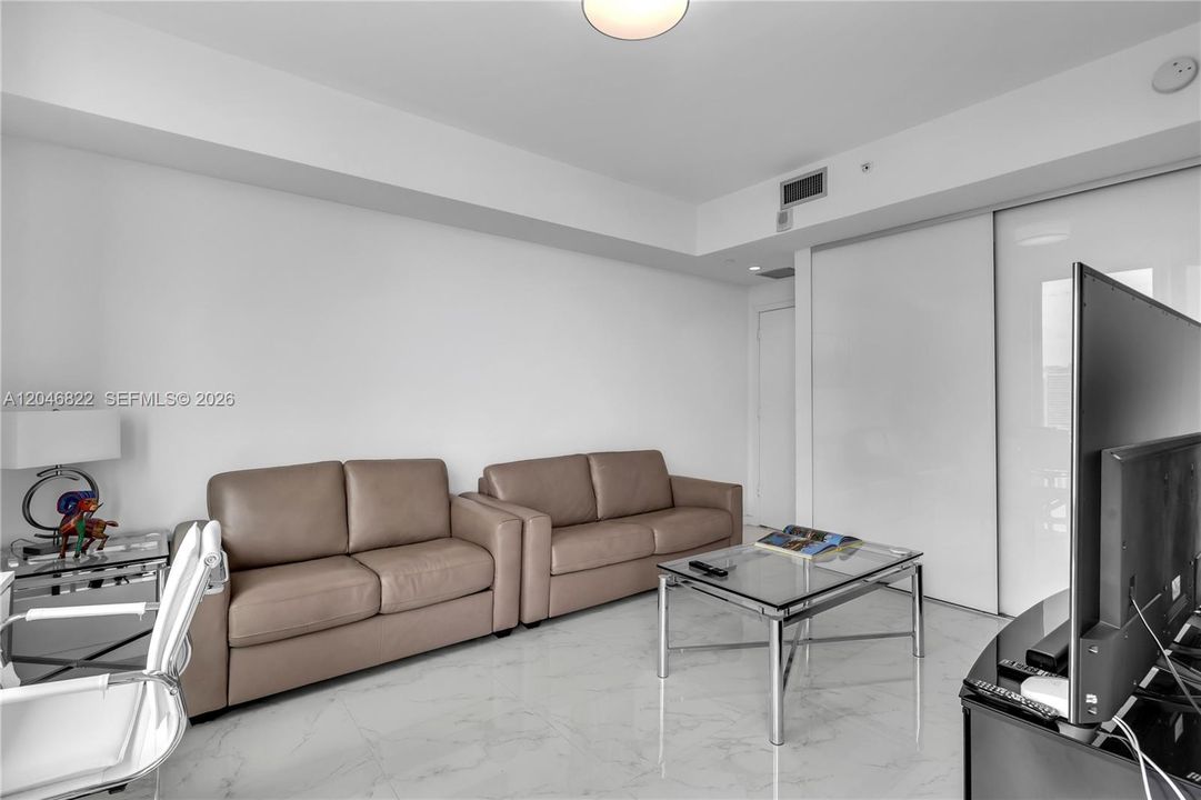 Comfortable lounge area with natural light and open flow