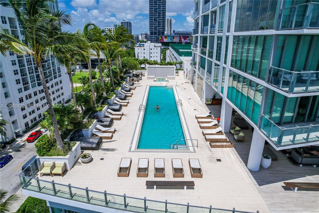 Resort-style bayfront pool deck at Biscayne Beach, Edgewater