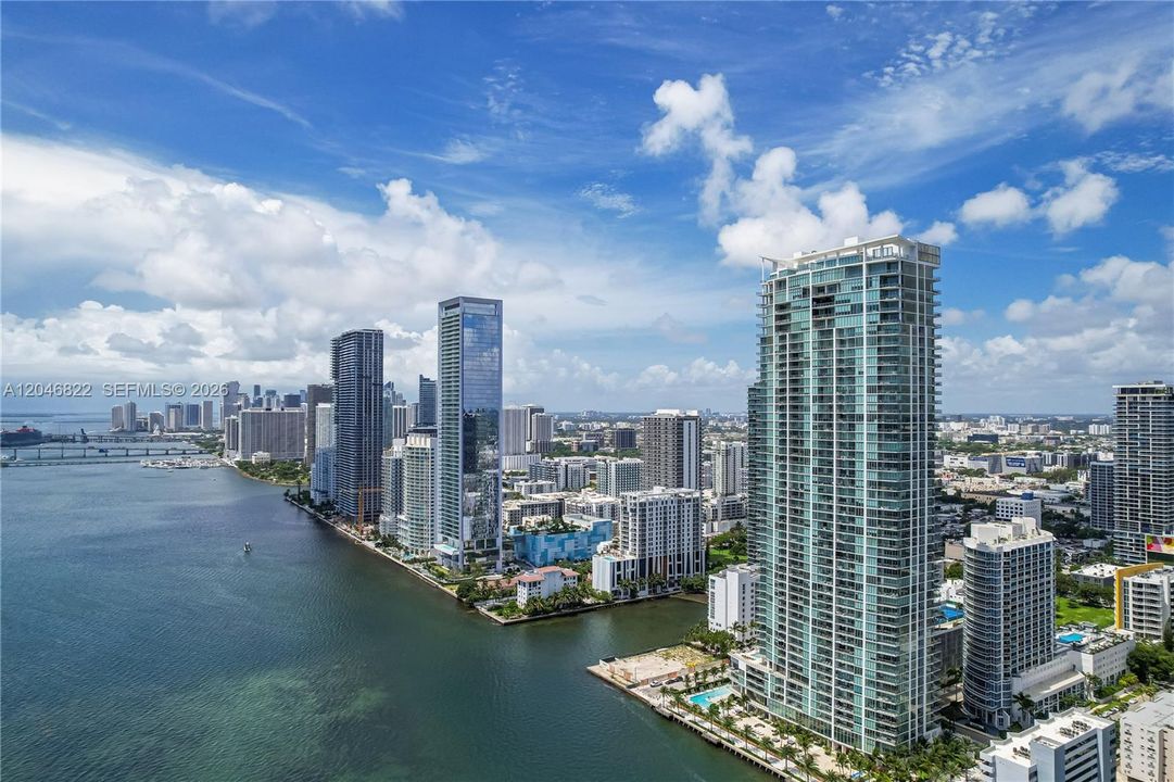 Aerial over Edgewater with Biscayne Bay and Miami skyline