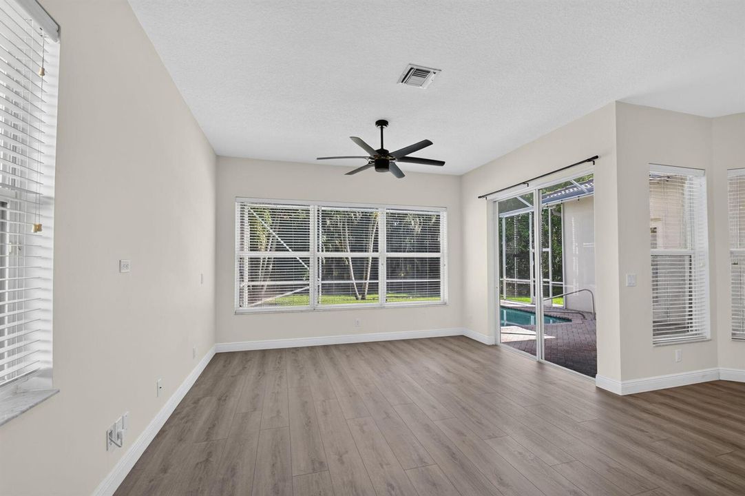 family room with sliders to pool