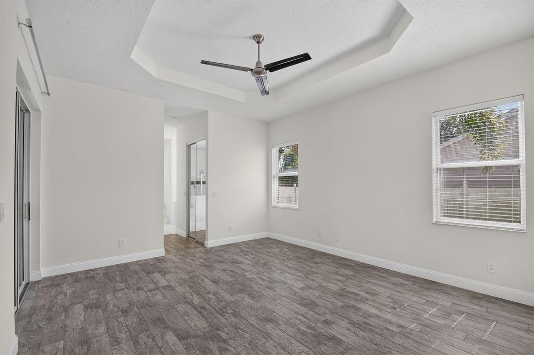 tray ceiling in primary bedroom