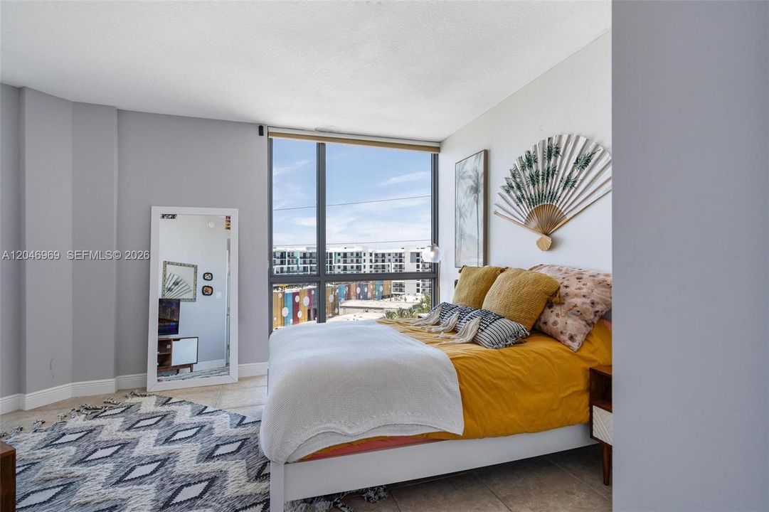 SECOND BEDROOM has closet, en suite bathroom, and its own exit to balcony