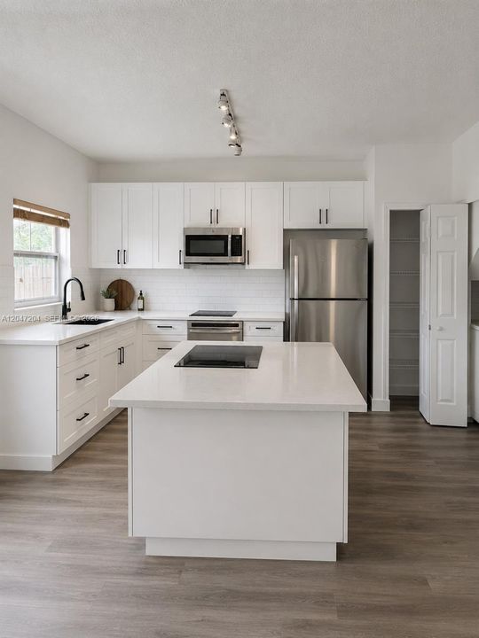 Virtual staging. The kitchen is under renovation.