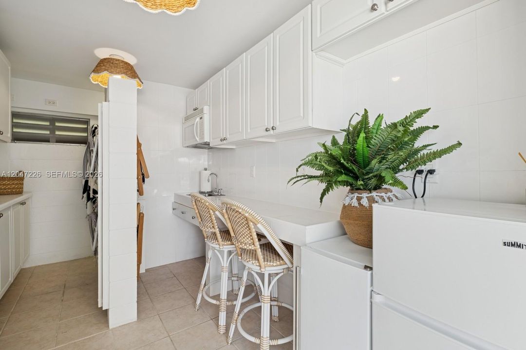 Cabana with ice maker, shower, chairs, etc.