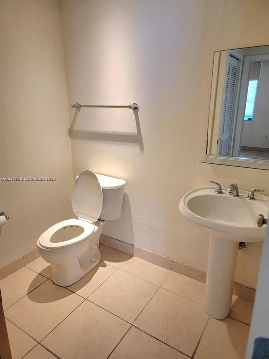 spacious half bath for your guests.