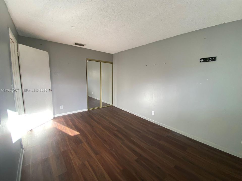 Bedroom 1 & ClosetFront Unit