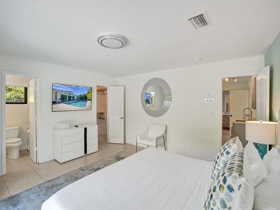 Master Bedroom Angled TV Bath Closet Vie