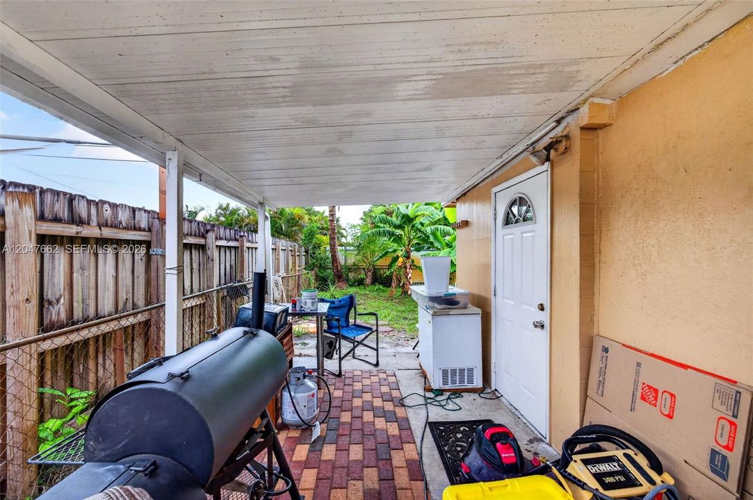Covered storage area or space for lawn equipment / golf cart, trailer etc