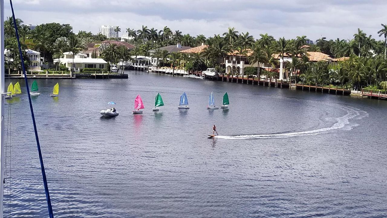 Sailboats with Surfer