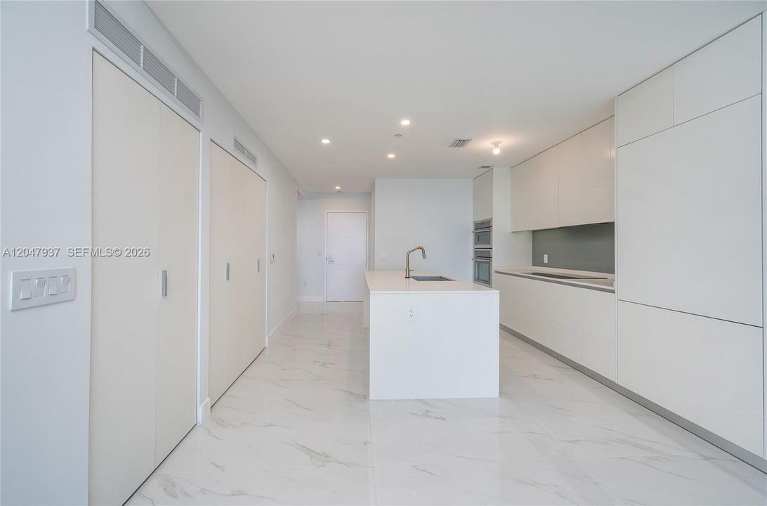 The doors to the left are the Laundry and A/C closet