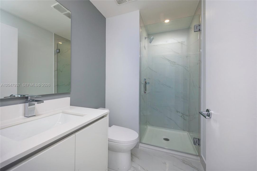 Complete Social Bath with shower. located next to the Den.
