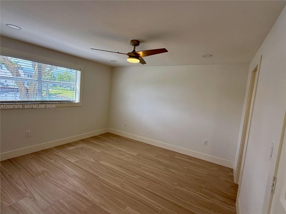 Tranquil view and new modern flooring, lighting fixtures and recessed lighting