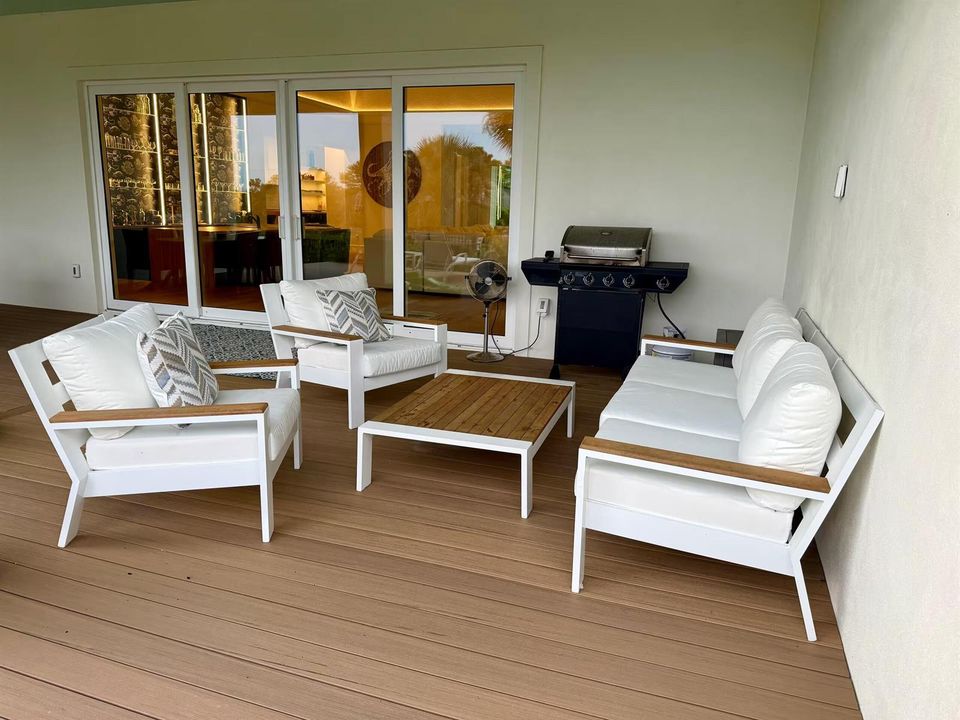covered back patio seating area - main h