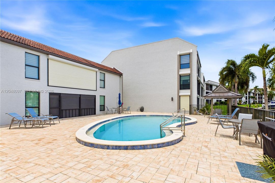 Relax and unwind at the waterfront community pool just steps from your door.