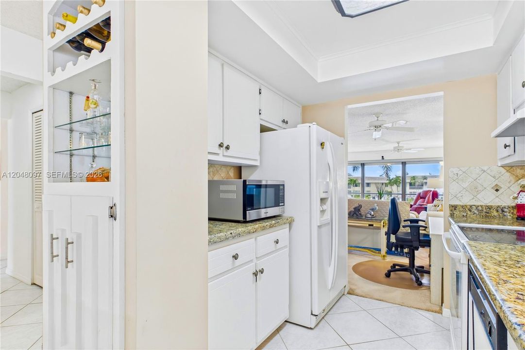 Built-in glass display and wine storage add charm and function