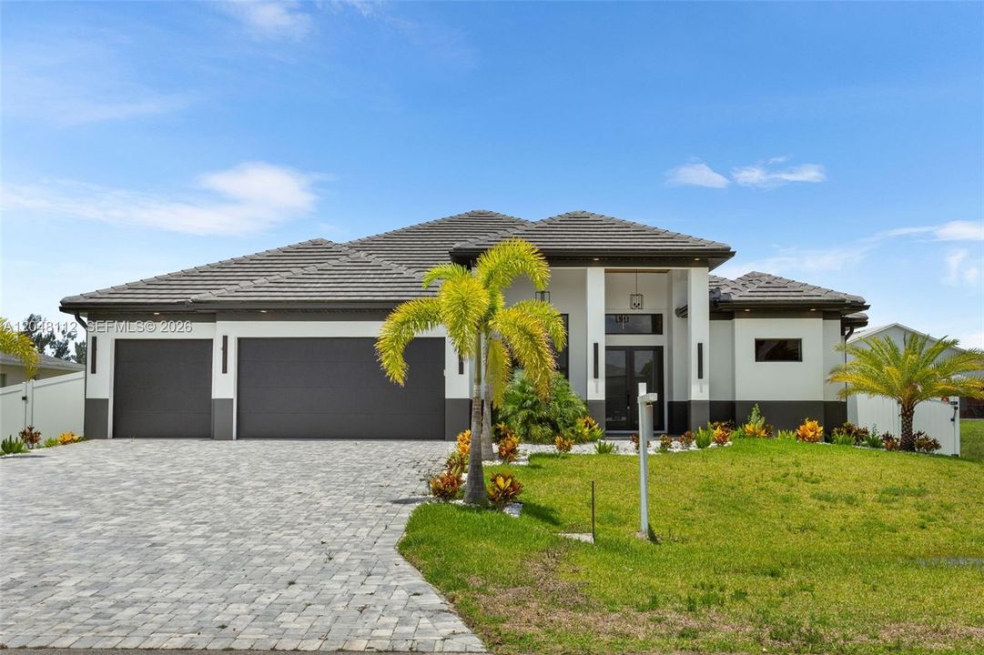 It features 2,420 sq ft of living area with BRIGHT and OPEN LAYOUT designed for both EVERYDAY COMFORT and UPSCALE ENTERTAINING