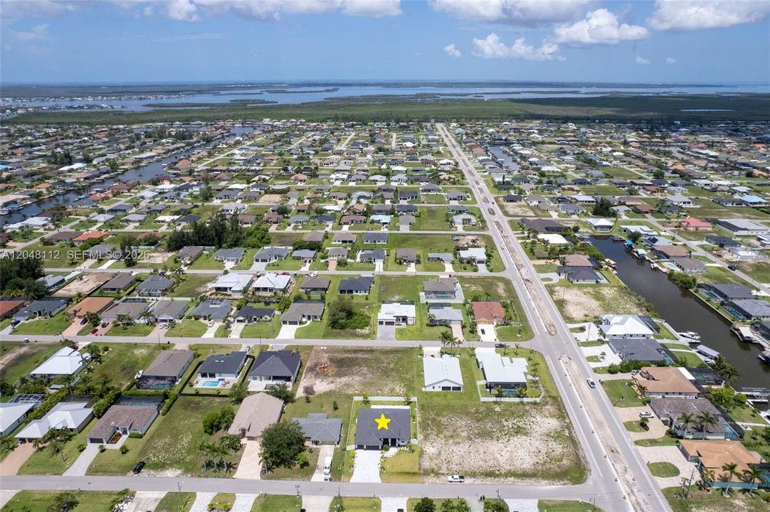 Located near the upcoming SEVEN ISLANDS WATERFRONT COMMUNITY in NW Cape Coral, featuring future marinas, parks, dining, and resort-style amenities, this property offers INCREDIBLE POTENTIAL!!!