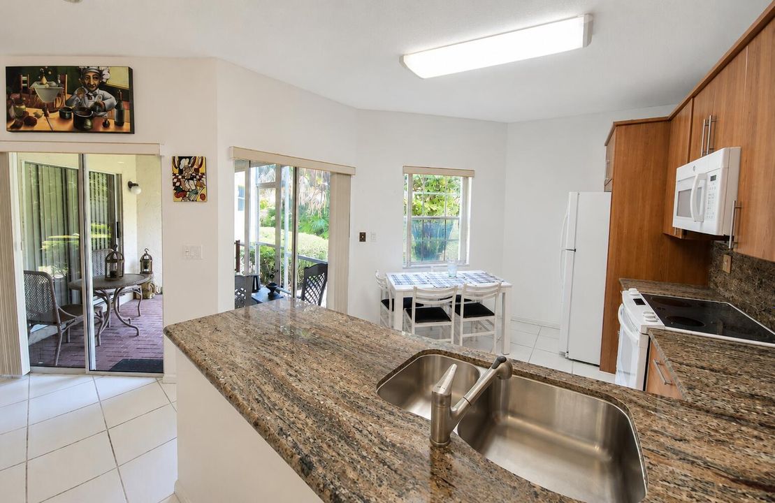 Sliding doors to patio & window