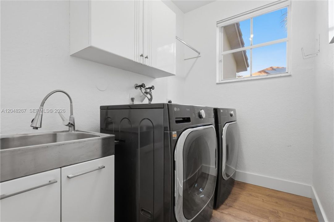 Laundry Room with a laundry tub and faucet.