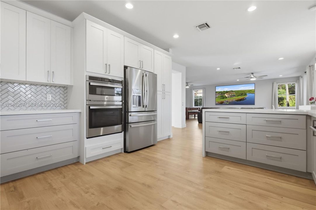 Wall Oven and Wall Microwave with GE Profile Refrigerator