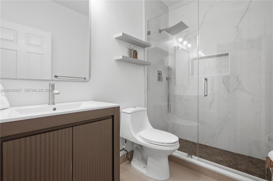 Downstairs complete bathroom.