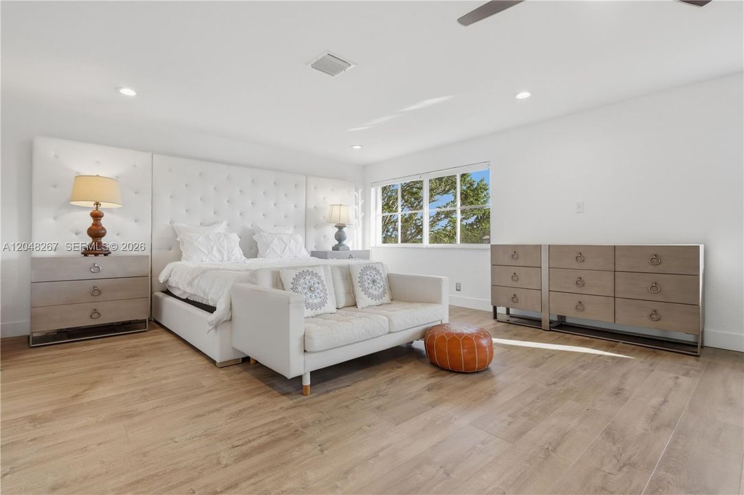 Bedroom Area with a leather sofa.