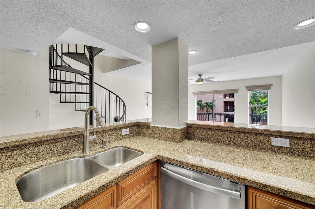 Open Kitchen, spiral staircase & balcony