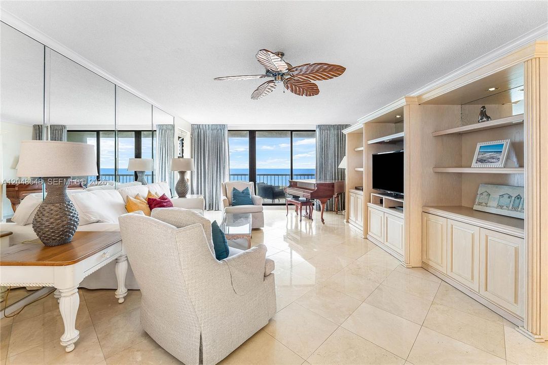 Large bright living room with direct ocean views