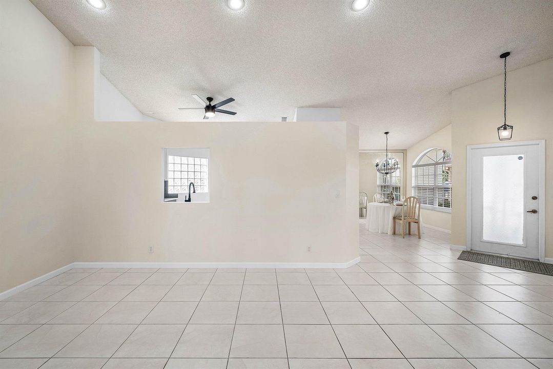 Large living room front door dining