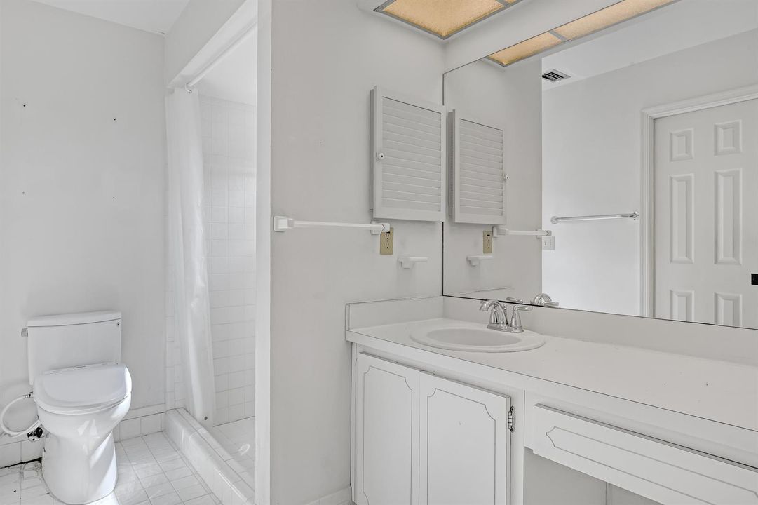 A walk-in shower in the primary bath.