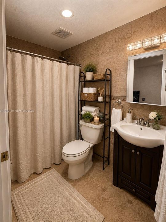 Bright and inviting secondary bedroom featuring a spacious closet and a versatile layout to accommodate family, guests, or a home office.
