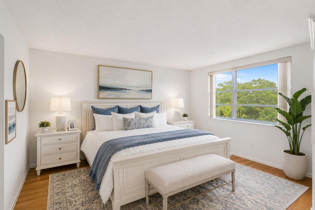 Virtually staged primary bedroom suite