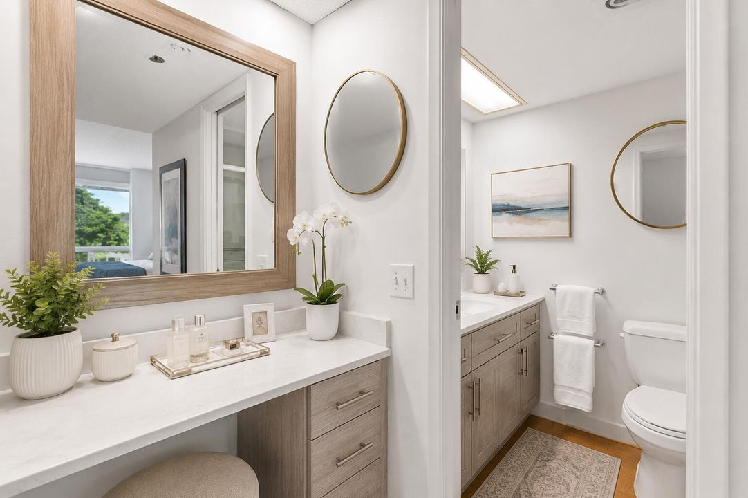 Virtually staged primary bathroom 1