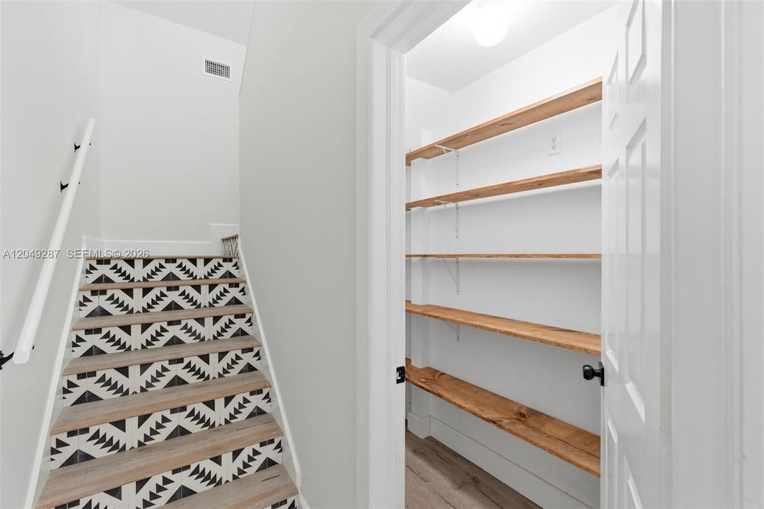 Hallway with Walk-In Pantry to Loft