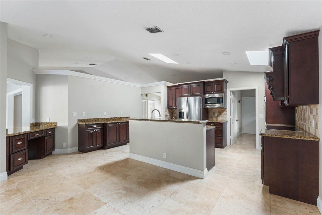 Kitchen with Desk and Bar Area