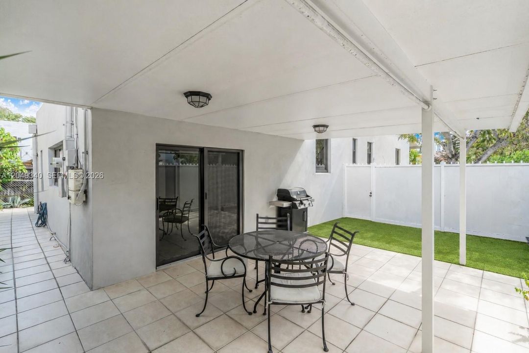NOTE: Grass in photo is digitally enhanced. Floor is currently cement.